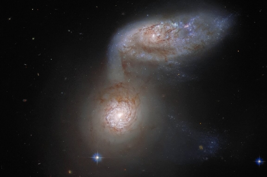 [VIDEO] Hubble a surprins două galaxii pe un curs de coliziune